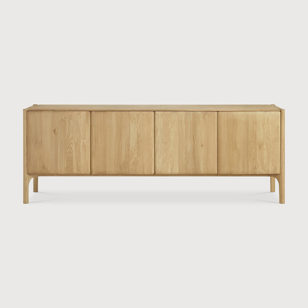 Featuring Pi Oak Sideboard by Ethnicraft at Amethyst Home. The PI collection honours nature’s design by keeping the strength, curves and lines, as nature intended. Interesting shapes are discovered in this sleek and stylish, polished imperfect, finish. Each PI item is finished by hand to ensure that the individual character of the wood is respected. The PI sideboard is striking and un. Amethyst Home provides interior design, new construction, custom furniture, and area rugs in the Omaha metro area