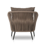 Featuring Porto Ellor Brown Outdoor Chair by Four Hands at Amethyst Home. The perfect place for outdoor daydreaming. A beautiful rope-based design is woven across a durable aluminum frame in a rich bronze finish. Topped with a wide cushion and throw pillow, all upholstered in 100% olefin, known for its UV-resistant, water-repellent and quick-drying abilities. Cover or store indoor. Amethyst Home provides interior design, new construction, custom furniture, and area rugs in the Nashville metro area