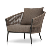 Featuring Porto Ellor Brown Outdoor Chair by Four Hands at Amethyst Home. The perfect place for outdoor daydreaming. A beautiful rope-based design is woven across a durable aluminum frame in a rich bronze finish. Topped with a wide cushion and throw pillow, all upholstered in 100% olefin, known for its UV-resistant, water-repellent and quick-drying abilities. Cover or store indoo. Amethyst Home provides interior design, new construction, custom furniture, and area rugs in the Washington metro area