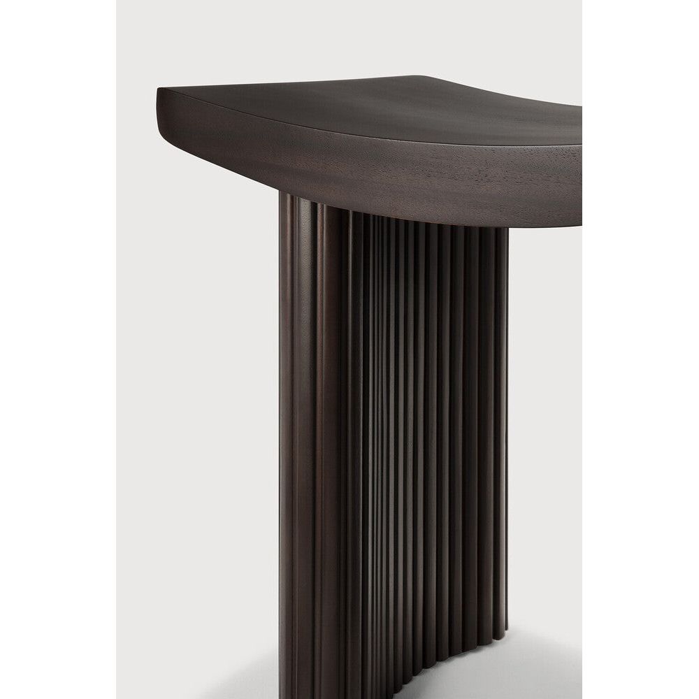 Featuring Roller Mahogany Dark Brown Max Stool by Ethnicraft at Amethyst Home. The Roller Max collection is remarkable in its design, distinguished with its stacked wood-stick effect. Both comfortable and compact, this eye-catching stool is versatile; position it solo, or combine with the wider Roller Max and Boomerang collection items to make a bold statement.Weight : 36 lb Dime. Amethyst Home provides interior design, new construction, custom furniture, and area rugs in the Washington metro area