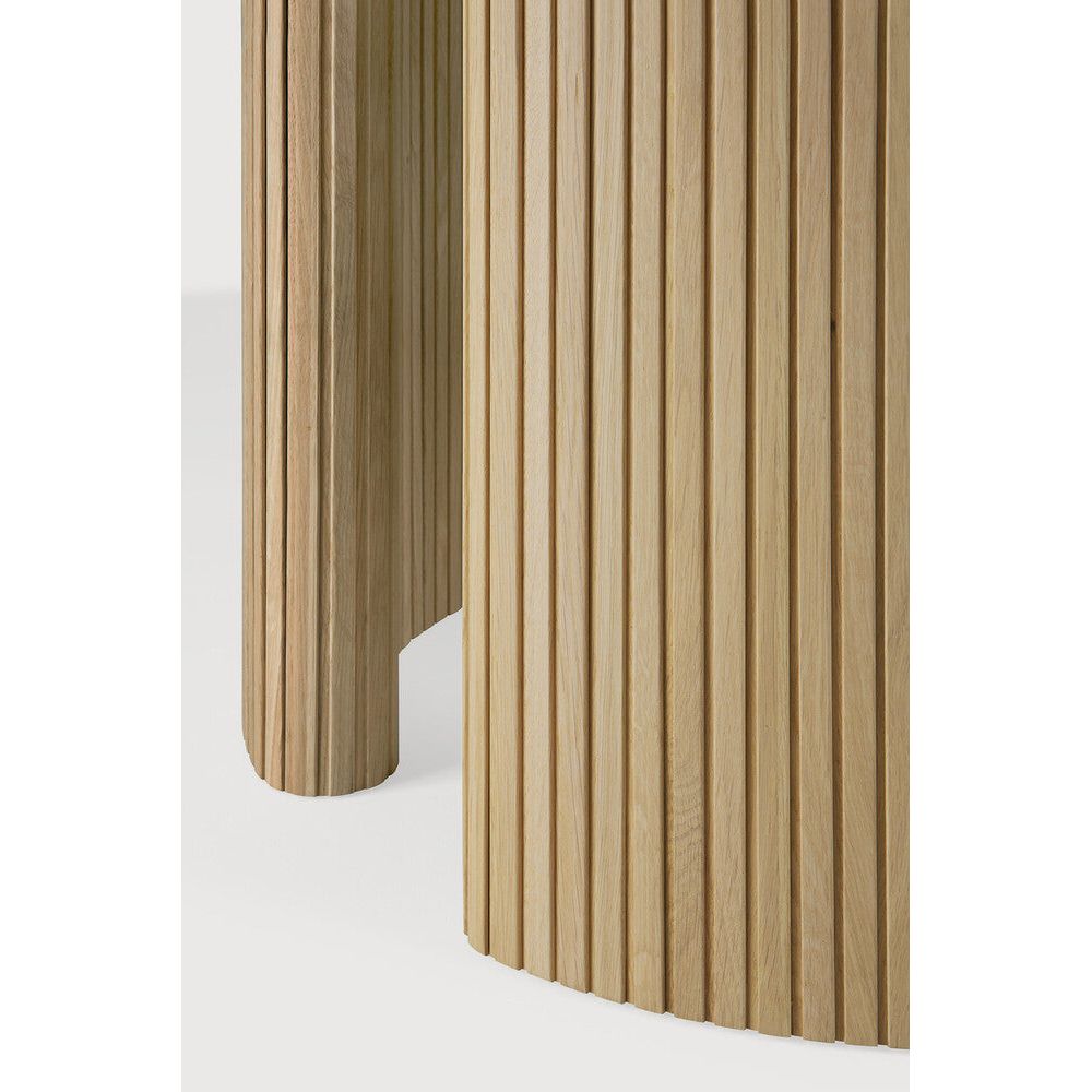 Featuring Roller Oak Round Max Dining Table by Ethnicraft at Amethyst Home. The Roller Max collection is remarkable in its design, distinguished with its stacked wood-stick effect. The dining table perfectly melds form with function. Featuring the option of reversable legs that can change the aesthetic to reflect personal style.Weight : 163 lbs Dimensions: 59.5" W x 59.5" L x 30" H. Amethyst Home provides interior design, new construction, custom furniture, and area rugs in the Tampa metro area