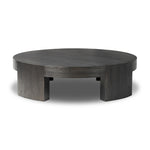 Featuring Sheffield Charcoal Oak Veneer Coffee Table by Four Hands at Amethyst Home. Made from thick, charcoal-finished oak, a rounded coffee table features four legs that pull through to the top, for an intriguing design detail.Overall Dimensions: 48.00"w x 48.00"d x 13.00"hWeight : 94.80 lbsMaterials : Oak Veneer. Amethyst Home provides interior design, new construction, custom furniture, and area rugs in the Charlotte metro area