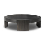 Featuring Sheffield Charcoal Oak Veneer Coffee Table by Four Hands at Amethyst Home. Made from thick, charcoal-finished oak, a rounded coffee table features four legs that pull through to the top, for an intriguing design detail.Overall Dimensions: 48.00"w x 48.00"d x 13.00"hWeight : 94.80 lbsMaterials : Oak Veneer. Amethyst Home provides interior design, new construction, custom furniture, and area rugs in the Des Moines metro area