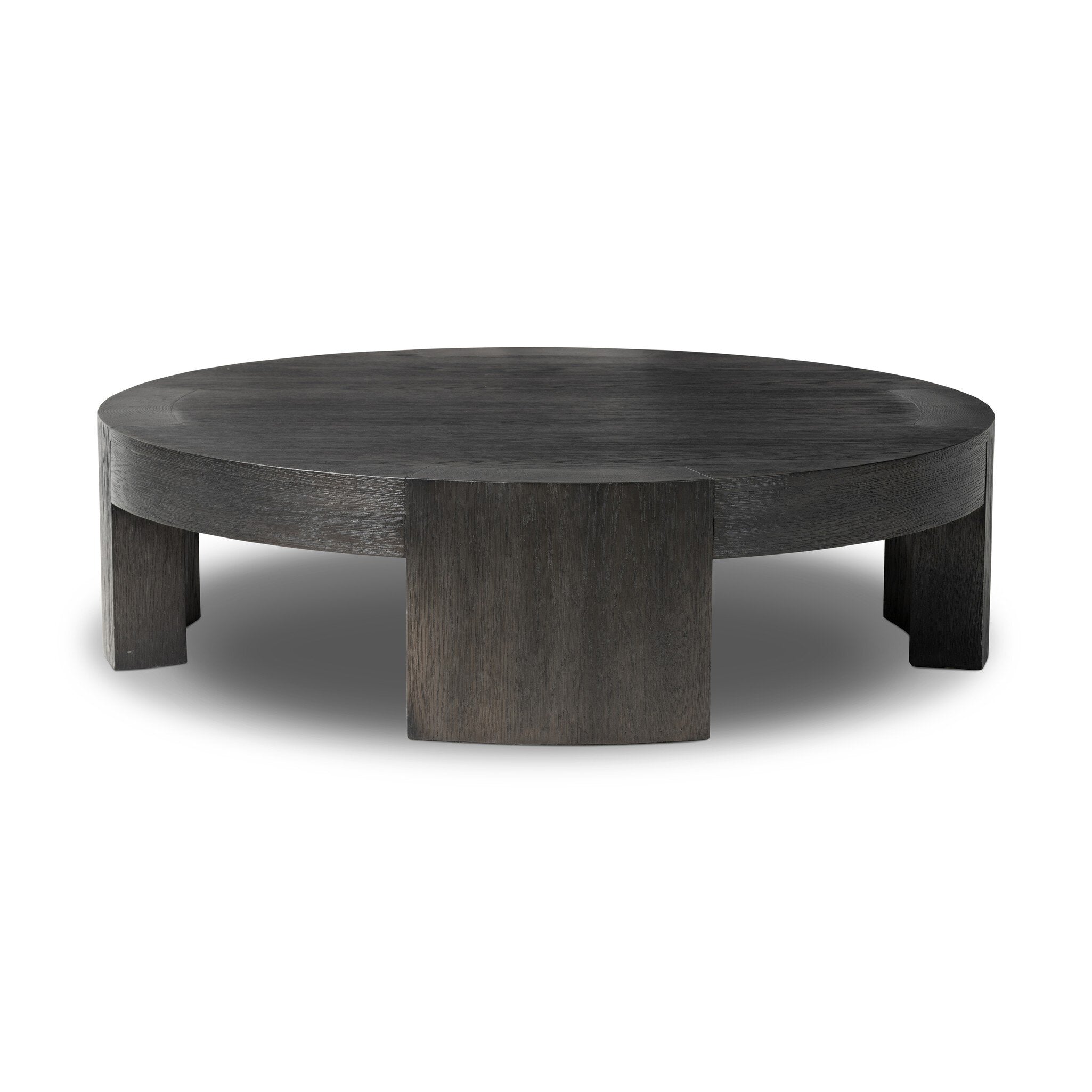 Featuring Sheffield Charcoal Oak Veneer Coffee Table by Four Hands at Amethyst Home. Made from thick, charcoal-finished oak, a rounded coffee table features four legs that pull through to the top, for an intriguing design detail.Overall Dimensions: 48.00"w x 48.00"d x 13.00"hWeight : 94.80 lbsMaterials : Oak Veneer. Amethyst Home provides interior design, new construction, custom furniture, and area rugs in the Des Moines metro area
