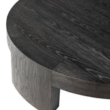 Featuring Sheffield Charcoal Oak Veneer Coffee Table by Four Hands at Amethyst Home. Made from thick, charcoal-finished oak, a rounded coffee table features four legs that pull through to the top, for an intriguing design detail.Overall Dimensions: 48.00"w x 48.00"d x 13.00"hWeight : 94.80 lbsMaterials : Oak Veneer. Amethyst Home provides interior design, new construction, custom furniture, and area rugs in the Monterey metro area