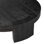 Featuring Sheffield Charcoal Oak Veneer Coffee Table by Four Hands at Amethyst Home. Made from thick, charcoal-finished oak, a rounded coffee table features four legs that pull through to the top, for an intriguing design detail.Overall Dimensions: 48.00"w x 48.00"d x 13.00"hWeight : 94.80 lbsMaterials : Oak Veneer. Amethyst Home provides interior design, new construction, custom furniture, and area rugs in the Omaha metro area