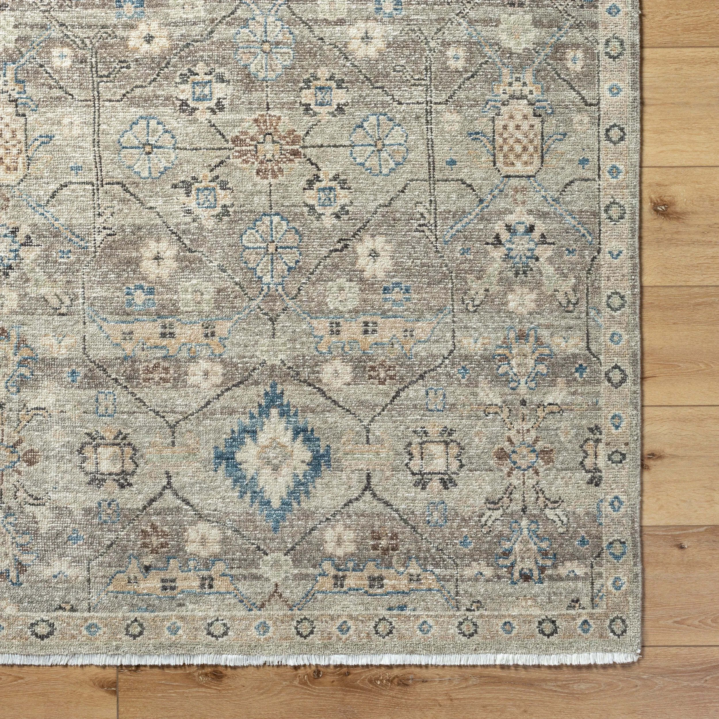 Featuring Anelka Hand-Knotted Rug by Surya at Amethyst Home. Indulge in luxury with the Anelka Hand-Knotted Rug. Skillfully crafted by hand, this exquisite rug brings an air of sophistication and elegance to any space. Made with the finest materials, it offers unparalleled softness and durability. Upgrade your home with this premium addition that transcends. Amethyst Home provides interior design, new home construction design consulting, vintage area rugs, and lighting in the Calabasas metro area.