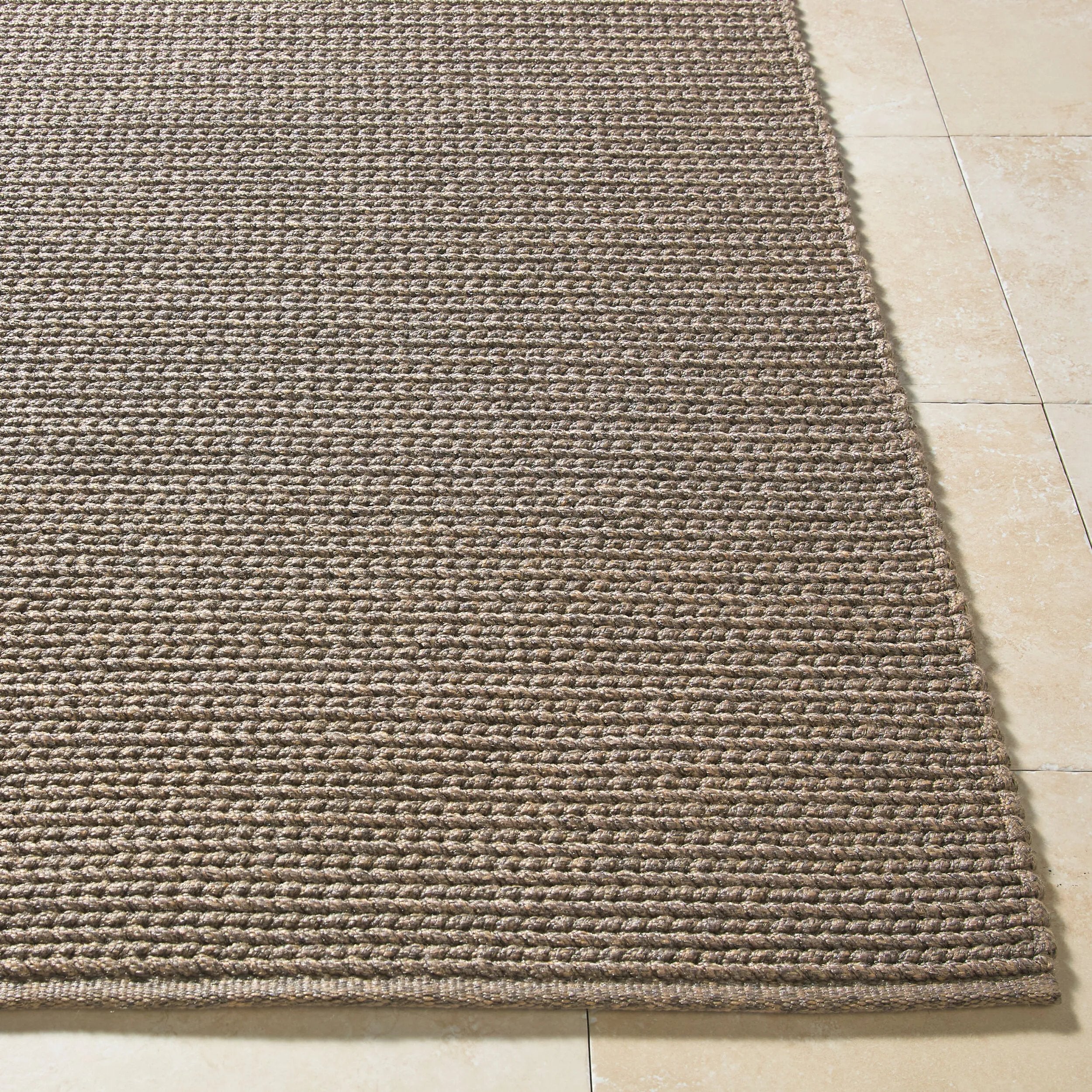 Add a touch of coastal charm to your home with the Beach House Hand Made Rug. Expertly hand woven in India, this rug is made from durable polypropylene, making it safe for outdoor use and easy to care for. Its stylish design can enhance any space, bringing a warm and welcoming vibe to your setting. Amethyst Home provides interior design, new home construction design consulting, vintage area rugs, and lighting in the Tampa metro area.