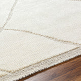 Featuring Tunus Cream Hand-Knotted Rug by Surya at Amethyst Home. The Tunus Cream Rug features a globally inspired design made from New Zealand wool. The hand-knotted rug adds wabi sabi charm to any room.
Hand-Knotted100% Wool
Clean spills immediately by blotting with a clean, dry sponge or cloth. Professional cleaning recommended. Appropriate rug pad is hi. Amethyst Home provides interior design, new home construction design consulting, vintage area rugs, and lighting in the Nashville metro area.