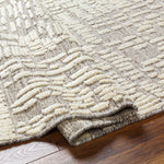Featuring Tunus Molly Hand-Knotted Rug by Surya at Amethyst Home. Introducing the Tunus Molly rug, hand-knotted from 100% wool and woven into an abstract, geometric pattern. Featuring taupe and ivory colors, this stylish and warm rug brings modern sophistication to any space.
Hand-Knotted100% Wool
Clean spills immediately by blotting with a clean, dry sponge or. Amethyst Home provides interior design, new home construction design consulting, vintage area rugs, and lighting in the Tampa metro area.