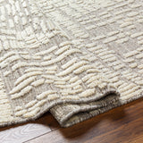 Featuring Tunus Molly Hand-Knotted Rug by Surya at Amethyst Home. Introducing the Tunus Molly rug, hand-knotted from 100% wool and woven into an abstract, geometric pattern. Featuring taupe and ivory colors, this stylish and warm rug brings modern sophistication to any space.
Hand-Knotted100% Wool
Clean spills immediately by blotting with a clean, dry sponge or. Amethyst Home provides interior design, new home construction design consulting, vintage area rugs, and lighting in the Tampa metro area.