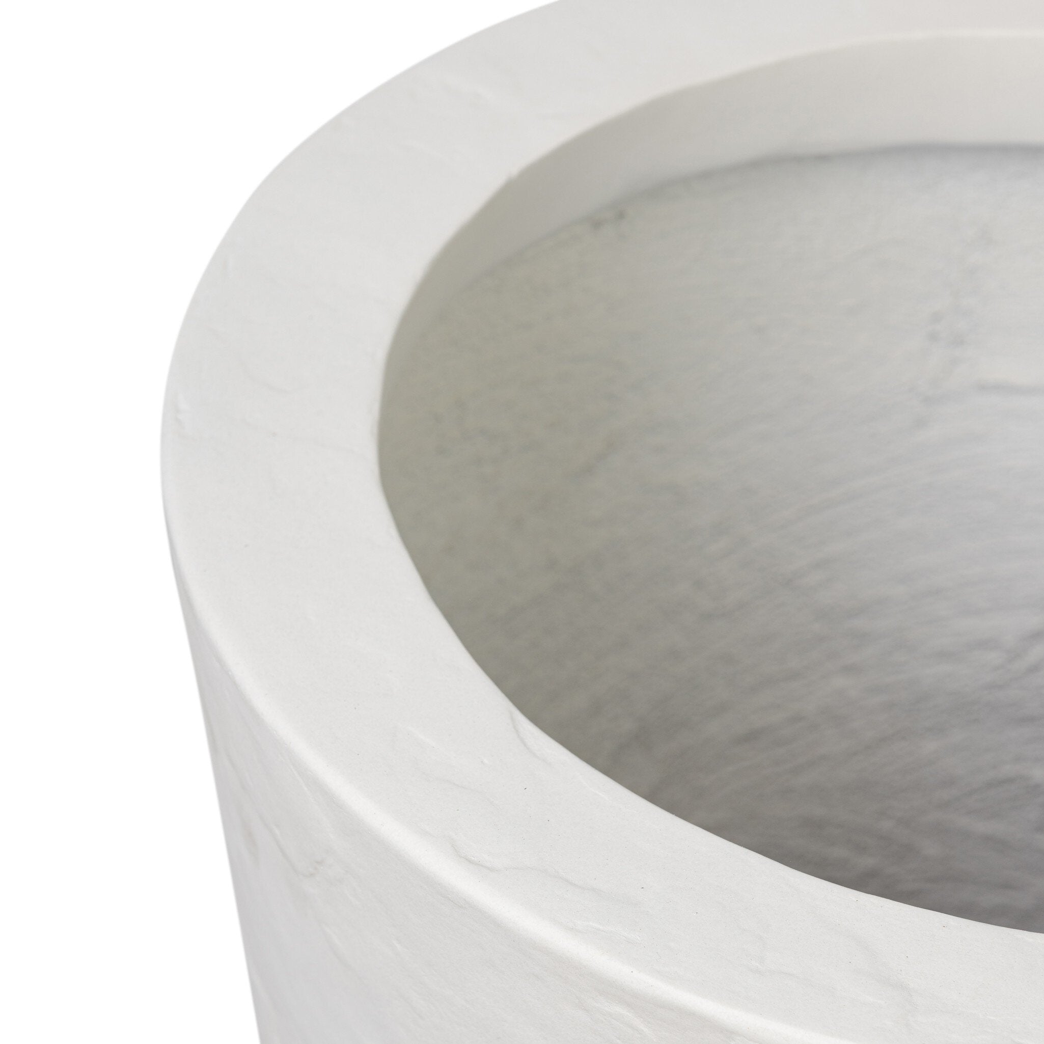 Featuring Suvi Textured White Concrete Planter by Four Hands at Amethyst Home. Textured white concrete forms a minimalist, tapered planter for a wide range of spaces. Cover or store indoors during inclement weather and when not in use.Overall Dimensions: 18.00"w x 18.00"d x 18.00"hWeight : 40.56 lbsMaterials : Concrete. Amethyst Home provides interior design, new construction, custom furniture, and area rugs in the Nashville metro area