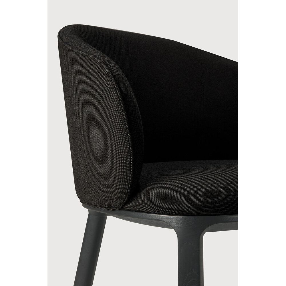 Featuring Unda Charcoal Oak Black Dining Chair by Ethnicraft at Amethyst Home. Experience dining comfort like never before with the Unda. Defined by its blend of materials, fluid lines and crafted piping trace the contours of the upholstered shell. Designed by Studio Segers, known for their pure and honest approach, every detail—down to the uniquely shaped legs—reflects sophistic. Amethyst Home provides interior design, new construction, custom furniture, and area rugs in the Des Moines metro area