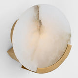 Featuring Melange Sconce Antique-Burnished Brass by Visual Comfort at Amethyst Home. Contrasting natural alabaster with metal in rounded forms and unique configurations, the Melange series by Kelly Wearstler blends the organic and the luxurious for a modern chic interior. Carved alabaster shades create a soft glow on walls and surfaces, while streamlined shap. Amethyst Home provides interior design, new home construction design consulting, vintage area rugs, and lighting in the Houston metro area.