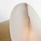 Featuring Melange Sconce Antique-Burnished Brass by Visual Comfort at Amethyst Home. Contrasting natural alabaster with metal in rounded forms and unique configurations, the Melange series by Kelly Wearstler blends the organic and the luxurious for a modern chic interior. Carved alabaster shades create a soft glow on walls and surfaces, while streamline. Amethyst Home provides interior design, new home construction design consulting, vintage area rugs, and lighting in the Newport Beach metro area.