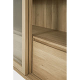 Featuring Wave Oak Cupboard by Ethnicraft at Amethyst Home. The subtle contours of the cabinet doors and the distinguished shape of the feet are what make the Wave collection so special. Made of solid wood, this storage cupboard’s doors and drawers have no handles and feature a soft closing mechanism.Weight : 256 lbs Dimensions: 18.5" W x 43.5" L x 72.5" H. Amethyst Home provides interior design, new construction, custom furniture, and area rugs in the Charlotte metro area