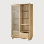 Featuring Wave Oak Cupboard by Ethnicraft at Amethyst Home. The subtle contours of the cabinet doors and the distinguished shape of the feet are what make the Wave collection so special. Made of solid wood, this storage cupboard’s doors and drawers have no handles and feature a soft closing mechanism.Weight : 256 lbs Dimensions: 18.5" W x 43.5" L x 72.5" H. Amethyst Home provides interior design, new construction, custom furniture, and area rugs in the Nashville metro area