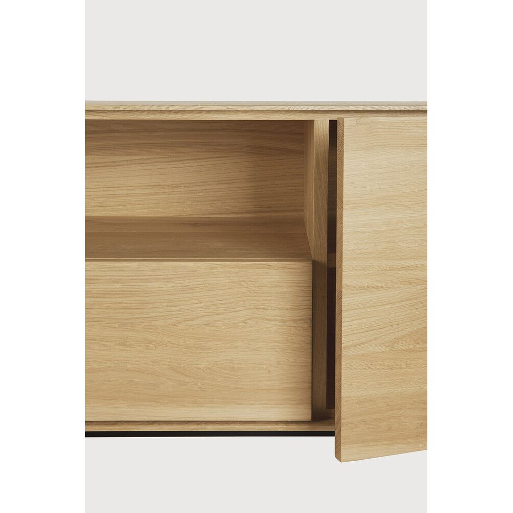 Featuring Whitebird Oak Tv Cupboard by Ethnicraft at Amethyst Home. For our Whitebird collection, designer Alain van Havre brings together opposing elements, combining soft round legs and eye-catching graphic lines into light and airy designs.Weight : 183 lbDimensions: 71 in L x 18 in D x 24.5 in HAnti-tipping mechanism : YesCollection : WhitebirdFinish : VarnishedMain Material : . Amethyst Home provides interior design, new construction, custom furniture, and area rugs in the Park City metro area