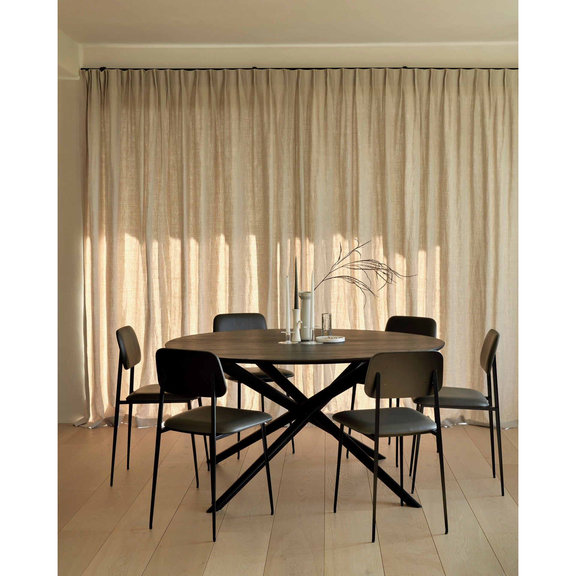 Featuring Mikado Black Oak Dining Table by Ethnicraft at Amethyst Home. The Mikado dining table's sculptural character is the result of a quest to find a balance between functionality and stability. The legs interlock like a well-thought-out puzzle, arranged under a solid round top. Designed by Alain van Havre.
Dimensions: 59.5"d x 59.5"w x 30"h
Brushed : Thi.  Amethyst Home provides interior design, new home construction design consulting, vintage area rugs, and lighting in the Dallas metro area.