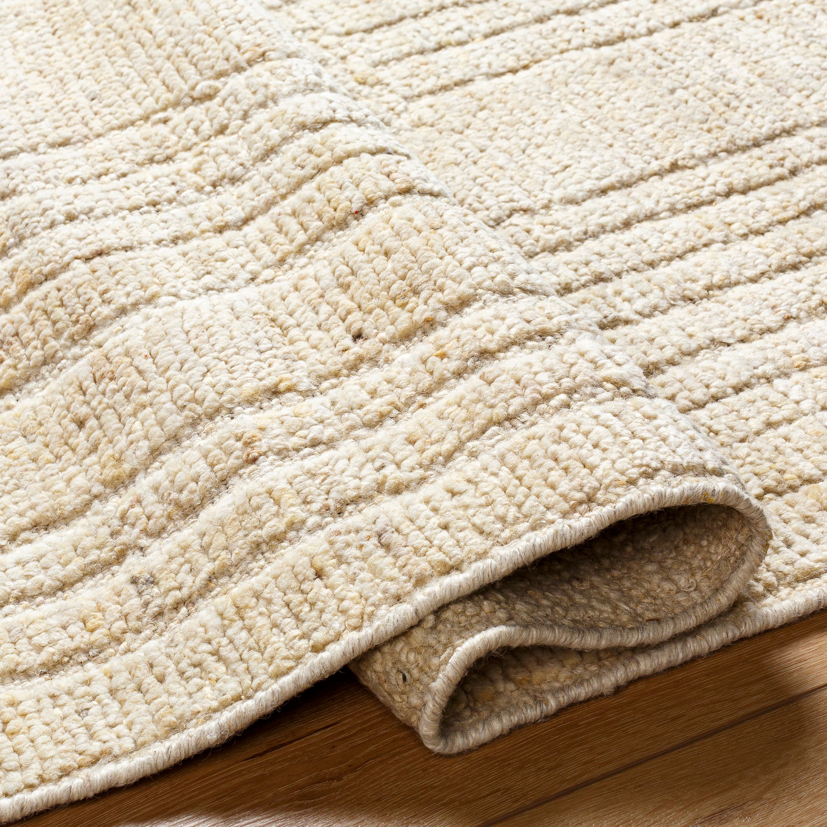 Featuring Khyber Hand-Knotted Rug by Surya at Amethyst Home. Bring a unique global flair to your home with the Khyber hand-knotted wool rug. Crafted from natural wool, this medium-pile rug is sure to add a touch of bohemian charm to any space. With its stunning design and intricate detailing, it is an ideal way to incorporate a touch of India into your d?c.  Amethyst Home provides interior design, new home construction design consulting, vintage area rugs, and lighting in the Nashville metro area.