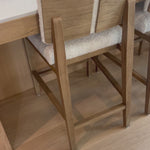 This stool is all about the textile -- gorgeous French inspired boucle with a cool toned oak base.Gorgeousback detail makes this Charles stool attractive from all angles. Amethyst Home provides interior design, new home construction design consulting, vintage area rugs, and lighting in the Laguna Beach metro area.