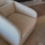 We adore the texture of this Topanga Swivel Chair - Knoll Natural. With a swivel feature - this is a perfect chair to use in your office, baby room, or other space needing a comfortable chair! Amethyst Home provides interior design, new home construction design consulting, vintage area rugs, and lighting in the Washington metro area.