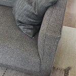 This Phillip Delta Tweed Sofa provides comfort and style in one piece. Crafted with high-quality materials and designed with ergonomic support in mind, this sofa is perfect for relaxing or entertaining. Its classic tweed fabric adds a touch of sophistication to any living space. Amethyst Home provides interior design, new home construction design consulting, vintage area rugs, and lighting in the Austin metro area.