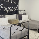 Vintage style for a classic bedroom look.  Durable, heavy iron makes for a supportive, wiggle-free bed. Amethyst Home provides interior design, new home construction design consulting, vintage area rugs, and lighting in the Charlotte metro area.