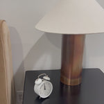 All-metal table lamp finished with a unique process to accomplish its iridescent acid wash look. The metal is first polished, then oxidized. It's finished with a heating process and lacquer seal for an antiqued look, complemented by a simple linen shade.Overall Dimensions: 20.00"w x 20.00"d x 24.00"hWeight : 7. Amethyst Home provides interior design, new home construction design consulting, vintage area rugs, and lighting in the Seattle metro area.