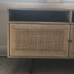 We love the organic feel of this Carmel Natural Mango Media Console. The shelves and posterior cord management make this the perfect media console for families wanting extra storage, while also adding a mid-century look to the room.   Size: 65"w x 18"d x 24"h