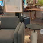 Simply sophisticated with this Cronos End Table - Polished White Marble. Finished in a polished white, a solid turned marble base supports a tray-style tabletop of grey-hammered iron, spurring beautifully eye-catching contrast for any living room or bedroom.   Overall Dimensions: 19.75"w x 19.75"d x 24.75"h