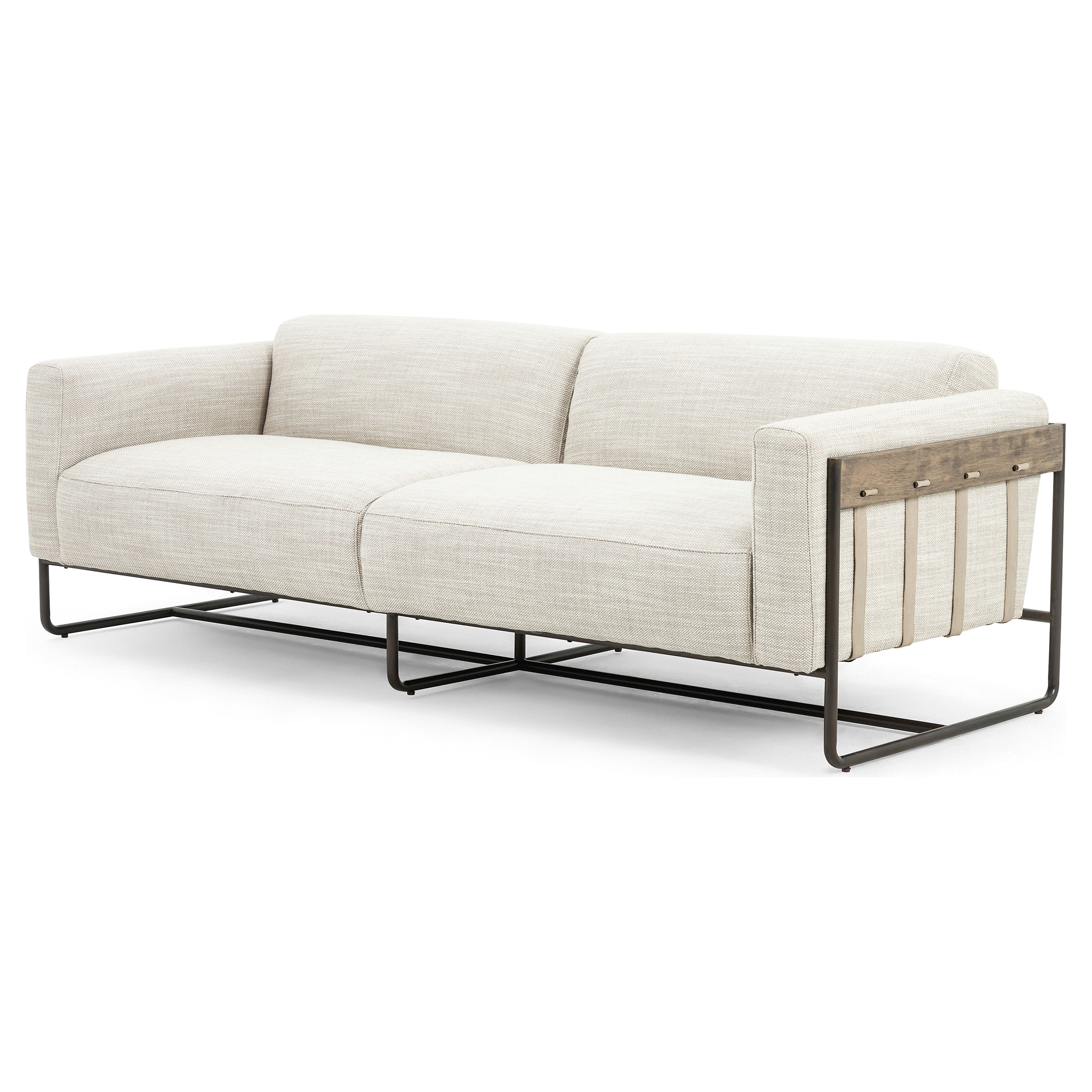 Featuring Ella 91" Sofa - Gable Taupe by Four Hands at Amethyst Home. Neutral gone novel with this Ella 91" Sofa - Gable Taupe. Taupe-colored upholstered seating is suspended by top-grain leather straps with handcrafted fastens, for an airy look. Solid rubberwood paneling wraps the frame’s entirety, while a black iron base lends lightness and contrast.
Ov.  Amethyst Home provides interior design, new home construction design consulting, vintage area rugs, and lighting in the Des Moines metro area.