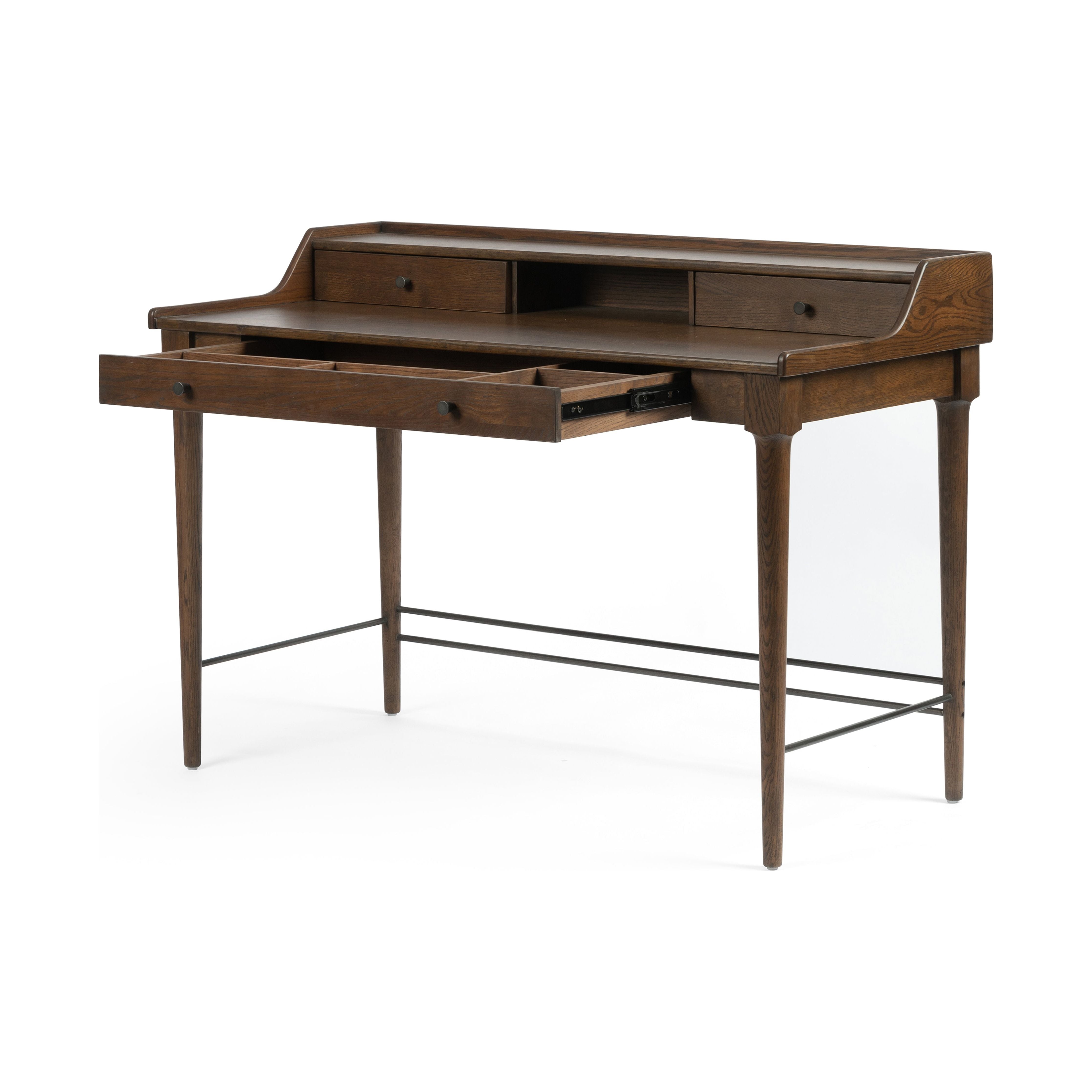Featuring Moreau Writing Desk by Four Hands at Amethyst Home. Dark-toasted oak's rich brown finish speaks to mid-century inspiration, while plenty of storage meets the needs of a modern office with this Moreau Dark Toasted Oak Writing Desk. 
Overall Dimensions: 48"W x 23.5"L x 34.75"H
Colors: Dark Toasted Oak, Aged BlackMaterials: Solid Oak, IronWeight: 79.  Amethyst Home provides interior design, new home construction design consulting, vintage area rugs, and lighting in the San Diego metro area.