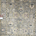 The Helena Grey / Gold HEL-04 rug from Loloi is hand-knotted of 100% wool, refined, yet versatile for any home. The Helena rug combines weathered tones and worldly patterns for a beautiful grounding element in any room. Amethyst Home provides interior design, new construction, custom furniture, and rugs for the Omaha and Lincoln metro area.