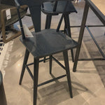 A fresh, bar-style take on mid-century Windsor seating is found in this Ripley Bar + Counter Stool - Black Oak. Featuring a bowed, sculptural silhouette and soft black finish to highlight the natural grain of weathered oak.