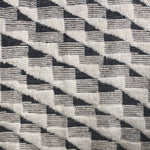 A nod to timeless Moroccan style, the Khalid Collection is hand-knotted in India by skilled artisans. The soft pile features 100% natural, undyed wool, lending slight variations in tones that make each piece it's own. Plus, each rug is finished with a thoughtfully designed fringe.  Hand Knotted 100% Wool KF-02 Natural/Black