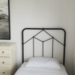 Vintage style for a classic bedroom look.  Durable, heavy iron makes for a supportive, wiggle-free bed. Amethyst Home provides interior design, new home construction design consulting, vintage area rugs, and lighting in the Calabasas metro area.