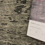 Hand-knotted in India of 100% wool, the Amara Silver/Dark Grey Rug creates a casual yet refined vibe with high-end appeal. Showcase in your bedroom, living room, entryway, or other high-traffic area of your home.   Hand Knotted 100% Wool AMM-02 Silver/Dark Grey