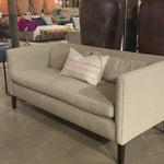 The Stewart Sofa by Cisco Brothers has a simple silhouette with striking angles and trim wooden accent legs. The wide bench cushion provides ample seating space ideal for entertaining. Pop some popcorn and pile on the throw pillows for cozy movie nights with the family. Photographed in Vintage Flax. Lifestyle Shot in Brevard Burlap. Amethyst Home provides interior design, new home construction design consulting, vintage area rugs, and lighting in the Park City metro area.