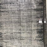 Hand-knotted in India of 100% wool, the Amara Silver/Dark Grey Rug creates a casual yet refined vibe with high-end appeal. Showcase in your bedroom, living room, entryway, or other high-traffic area of your home.   Hand Knotted 100% Wool AMM-02 Silver/Dark Grey