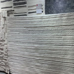 Dimensional yet soft, the Bennett Ivory / Pebble Area Rug is hand-knotted of wool, viscose and polyester in India. Featuring a new carve like high-low pile, Bennett has an ivory base with abstract tonal designs. Plus, it's plush underfoot-- a great choice for your office, bedroom, or other medium traffic areas.   Hand Knotted 45% Wool | 32% Viscose | 17% Polyester | 6% Other Fibers Pile BEN-04 Ivory/Pebble