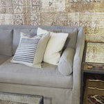 A romantic swooped arm and a super cozy bench style cushion makes the Dalia Sofa by Cisco Brothers one of our favorites!  Photographed in Molino White 100% cotton and Brevard Natural. Amethyst Home provides interior design, new home construction design consulting, vintage area rugs, and lighting in the Calabasas metro area.