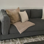 Streamlined yet comfortable!  We loved the subtle piping of the cushion details and stress-free color!  Flexible style, luxurious comfort and family-friendly upholstery. Clean, simple lines and black iron base keep everything casual and chic.  Overall Dimensions: 92.00"w x 38.00"d x 30.00"h Seat Depth: 28" Seat Height: 17" Arm Height from Floor: 24" Arm Height from Seat: 7"