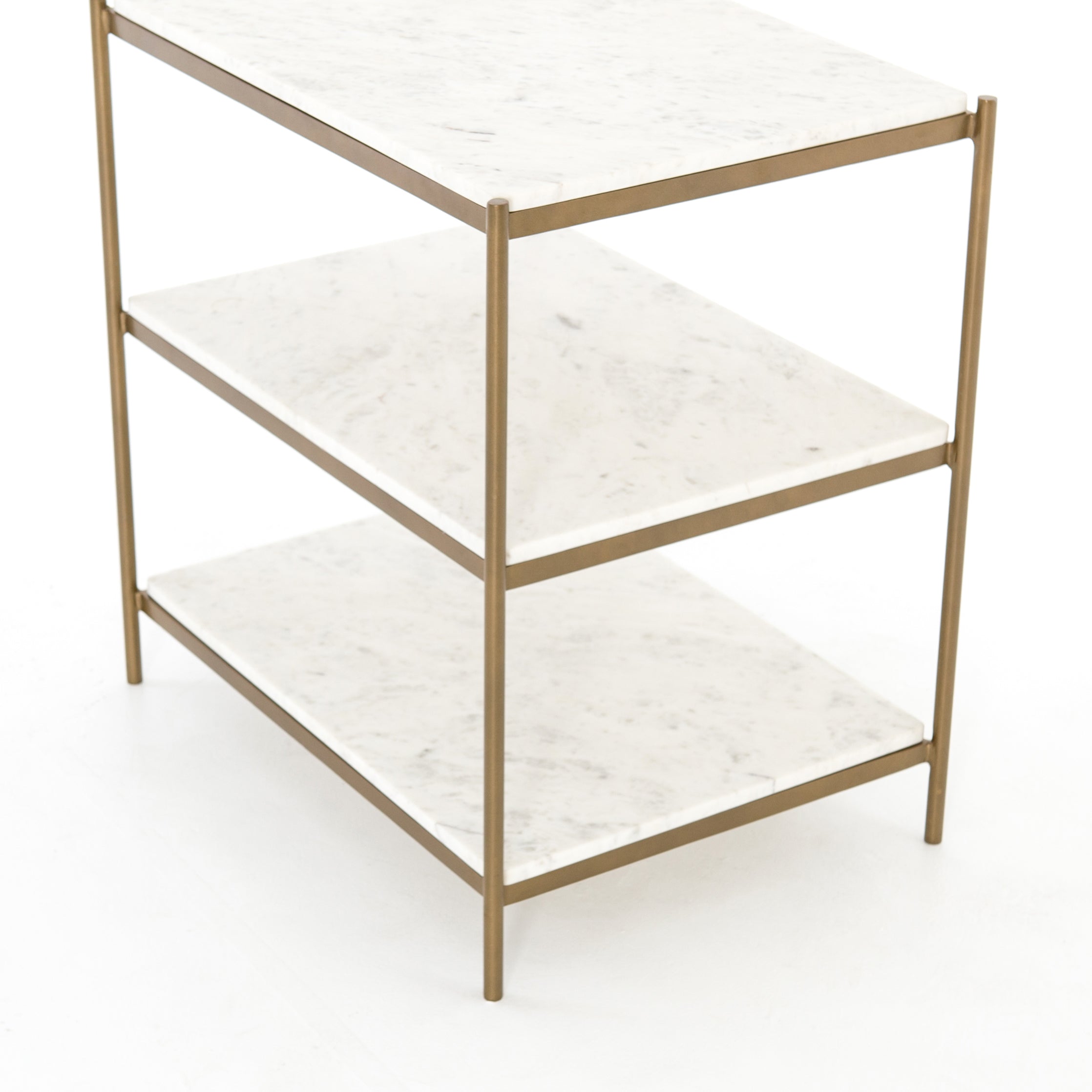 Featuring Felix Nightstand - Antique Brass by Four Hands at Amethyst Home. Add a pop of sophistication to any space. Classic white marble lays three tiers of smooth shelving for plenty of space, while antique brass-finished iron framing places a feminine spin on bedside storage.
Overall Dimensions: 25"W x 18"L x 26"H
Colors: Antique Brass, Polished White.  Amethyst Home provides interior design, new home construction design consulting, vintage area rugs, and lighting in the Kansas City metro area.