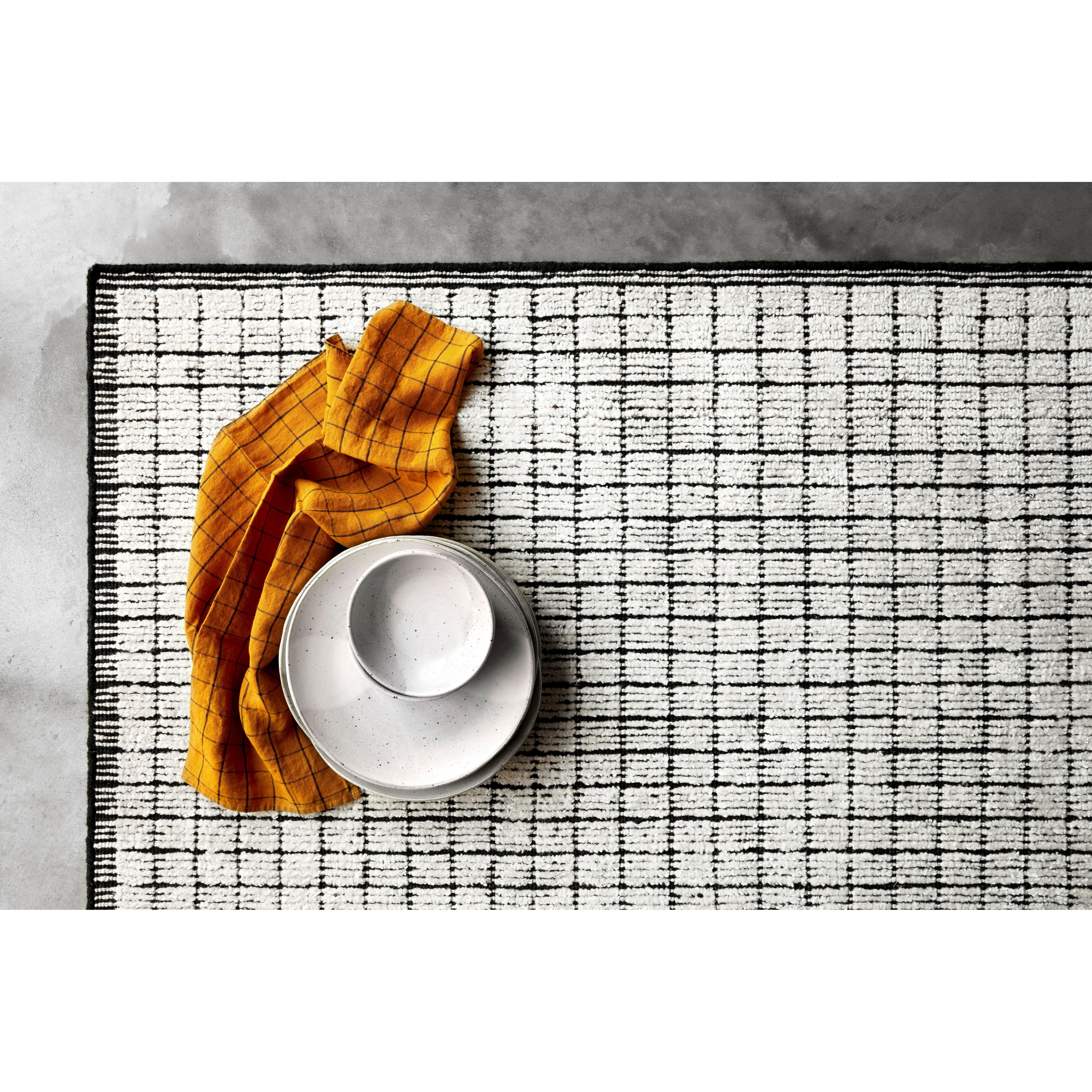 Featuring Beverly Ivory/Black Rug by Loloi at Amethyst Home. Modern and refined, the Beverly Ivory/Black rug from Loloi is hand-loomed by master artisans of viscose and wool pile. Clean lines and minimalist hues allow you to layer Beverly into any room.
Hand Loomed69% Viscose | 31% WoolBEV-01 Ivory / Black
Clean spills, including water, immediately by blottin.  Amethyst Home provides interior design, new home construction design consulting, vintage area rugs, and lighting in the Austin metro area.