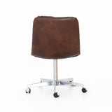 Featuring Malibu Desk Chair - Antique Whiskey by Four Hands at Amethyst Home. Paired back and fashion-forward, this minimalist desk chair in a dark chestnut top-grain leather offers maximum comfort. Inspired by workspaces of the ‘50s and ‘60s. Stainless steel casters make for stylish ease in the workplace. Height not adjustable.
Overall Dimensions: 20.75"W x 2.  Amethyst Home provides interior design, new home construction design consulting, vintage area rugs, and lighting in the Tampa metro area.