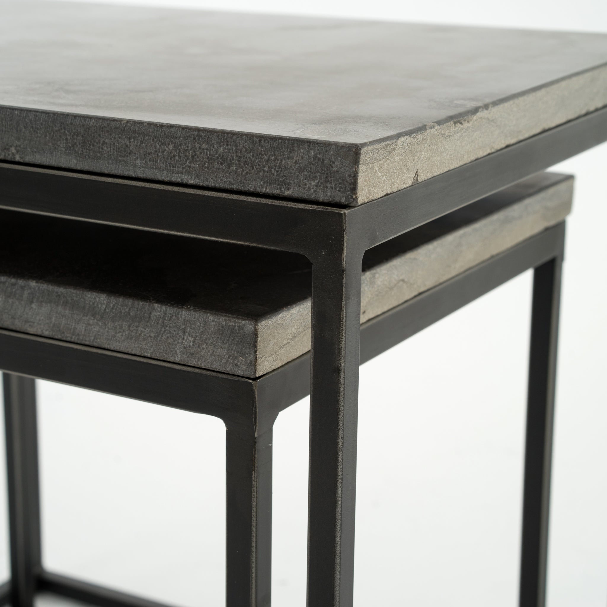 Featuring Harlow Nesting Tables - Set of 2 by Four Hands at Amethyst Home. Spare beauty, casual elegance. A gunmetal-finished Parsons base with hand-rubbed, dimensional edges supports two rough-hewn bluestone slabs that feel found and perfectly placed.
Dimensions: Large 20"W x 16"L x 19"H  ; Small 17"W x 13.5"L x 16"HColors: Gunmetal, BluestoneMaterials: I.  Amethyst Home provides interior design, new home construction design consulting, vintage area rugs, and lighting in the Portland metro area.