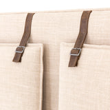 Featuring Leigh Upholstered Bed - Palm Ecru by Four Hands at Amethyst Home. Safari styling gets a modern reboot with this Leigh Upholstered Bed. Linen-blend upholstery of neutral taupe lays a texture-rich base for a forward-thinking bedroom look. Brown leather straps secure decorative headboard pillows, suspended for eye-catching effect. Box spring required.
.  Amethyst Home provides interior design, new home construction design consulting, vintage area rugs, and lighting in the Austin metro area.