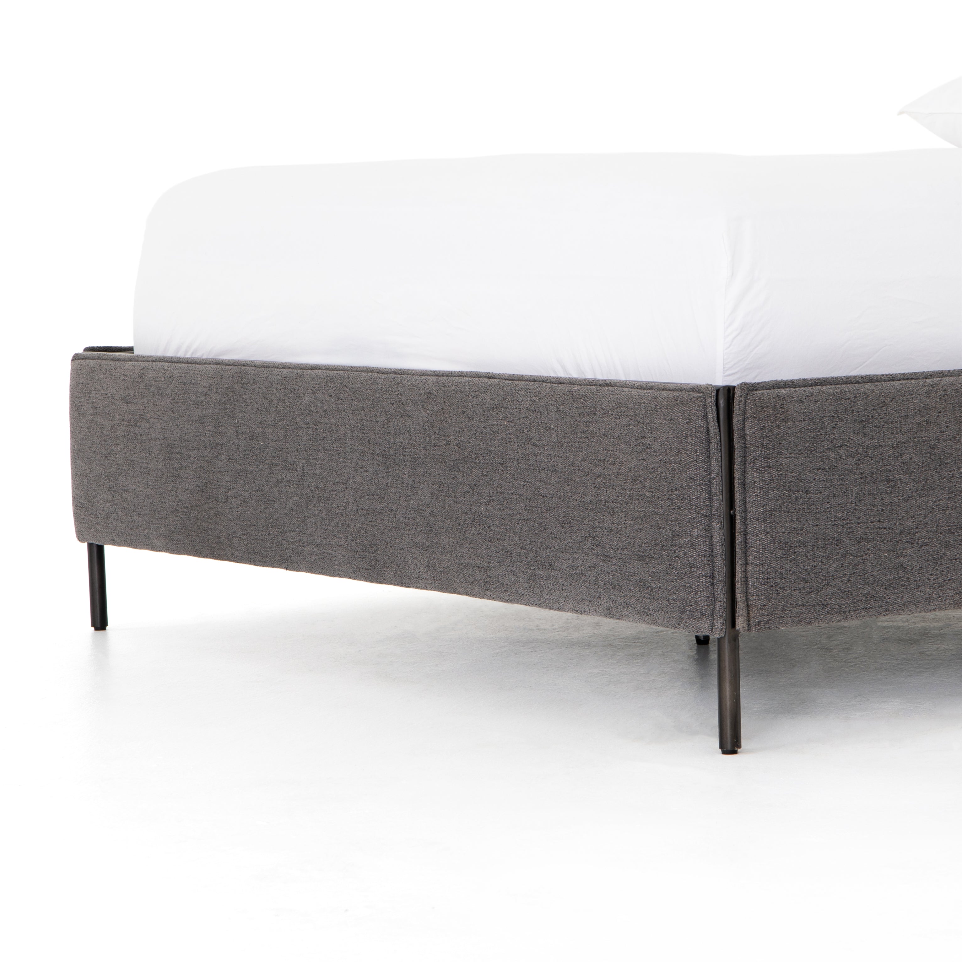 Featuring Leigh Upholstered Bed - San Remo Ash by Four Hands at Amethyst Home. The black straps on this Leigh San Remo Ash Upholstered Bed give any bedroom a stylish, modern look. 
Queen Size: 65"W x 84.5"L x 60.25"HKing Size: 80.75"W x 84.5"L x 60.25"H
Colors: San Remo Ash, Distressed Black, Waxed Black (pc)Materials: 100% Polyester, 85% Pl, 15% Pu, Iron.  Amethyst Home provides interior design, new home construction design consulting, vintage area rugs, and lighting in the Miami metro area.