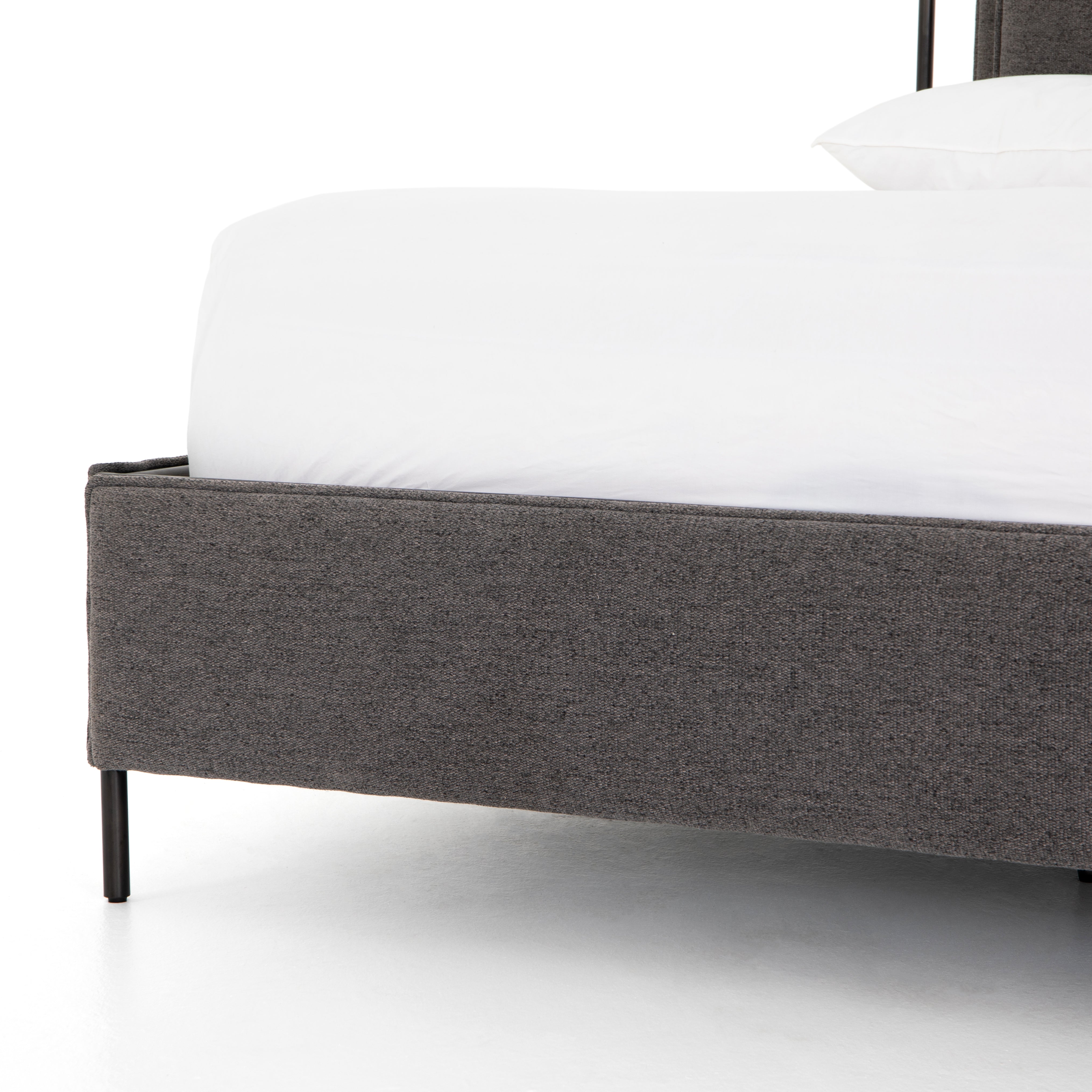 Featuring Leigh Upholstered Bed - San Remo Ash by Four Hands at Amethyst Home. The black straps on this Leigh San Remo Ash Upholstered Bed give any bedroom a stylish, modern look. 
Queen Size: 65"W x 84.5"L x 60.25"HKing Size: 80.75"W x 84.5"L x 60.25"H
Colors: San Remo Ash, Distressed Black, Waxed Black (pc)Materials: 100% Polyester, 85% Pl, 15% Pu, Iron.  Amethyst Home provides interior design, new home construction design consulting, vintage area rugs, and lighting in the Portland metro area.